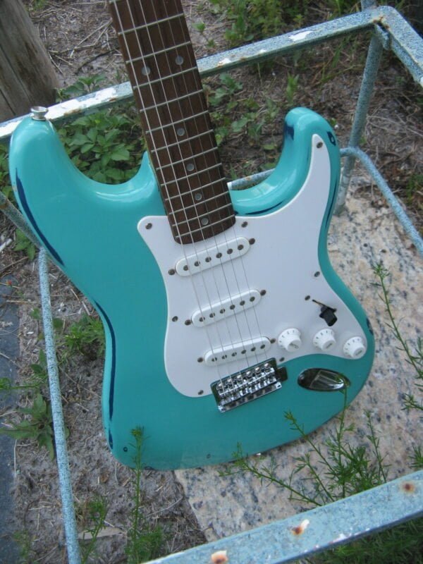 Surf green stratocaster with white pickguard