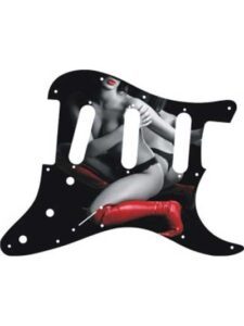 Barely-covered woman in black thong panties with knee-hight red boots