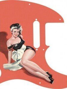 Brunette pinup girl Doris wearing black lingerie with large white bow at waist