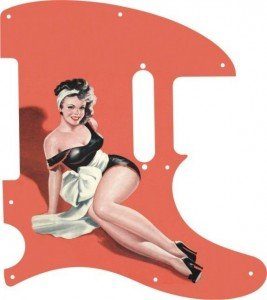 Brunette pinup girl Doris wearing black lingerie with large white bow at waist