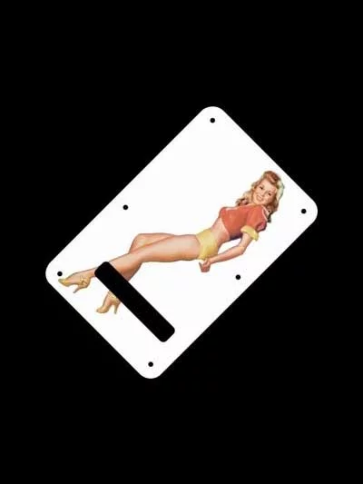 Blonde pinup girl wearing orange-red blouse with yellow panties and heals on a guitar backplate