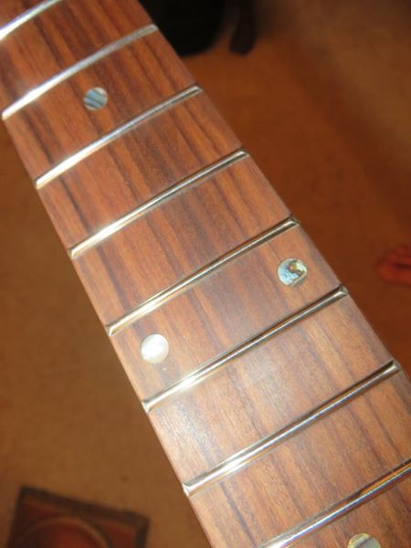 Roasted Curly Maple Telecaster guitar neck frets with abalone dots