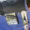 close-up of front blue flame maple topped tele