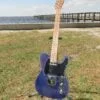 complete guitar of blue flame maple topped tele