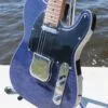 By the water close-up of blue flame maple topped tele