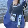 by the water close-up of blue flame maple topped tele